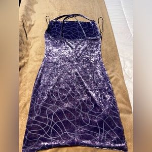 Beautiful Bebe dress color is lilac great for any party